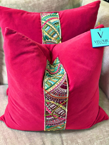 Hot pink velvet pillows with embroidered trim