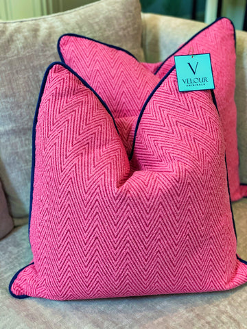 Hot pink Chenille pillows with navy velvet trim